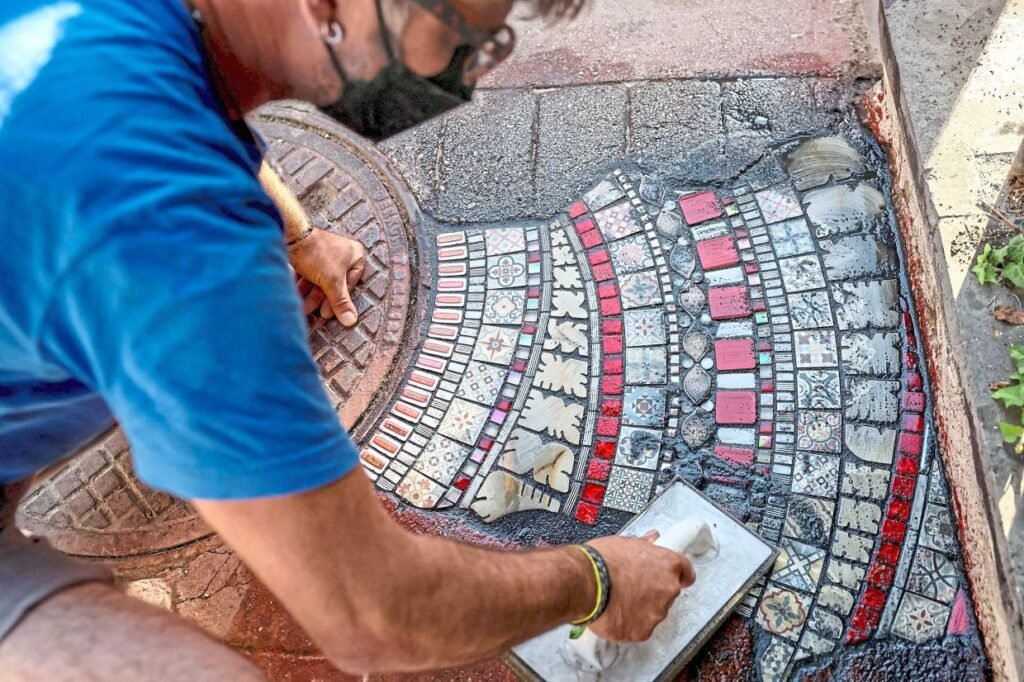 Patching pavements, French artist brings flash of colour to Ankara streets