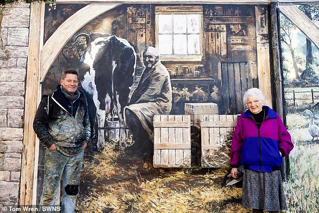 Meet the artist behind ‘Muriel’s garden’: Painter who gave flower-loving great-grandmother ‘dream’ artwork on side of house has transformed famous town with his fantasy landscapes
